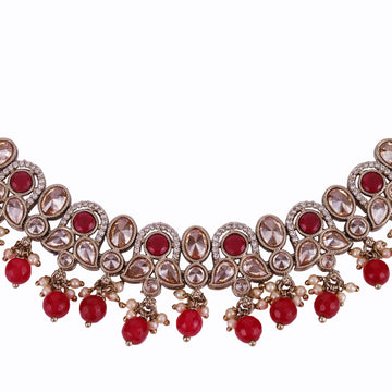 Leaf and paisley design red stone gold plated choker necklace set with maang tikka