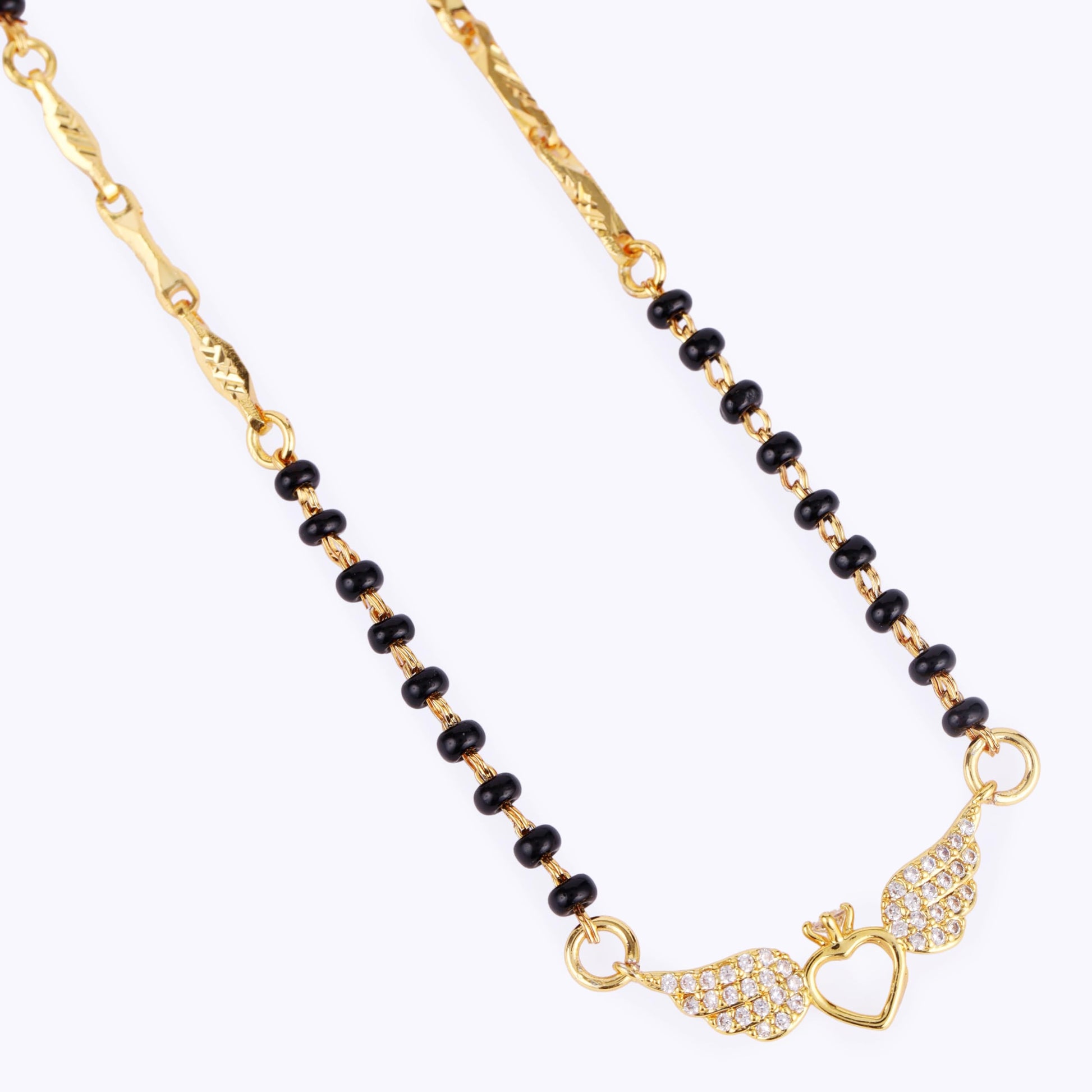 Saloni Fashion Jewellery Traditional Eye-Catchy Leaf and Heart Shape Gold Plated Black Beaded Adjustable Chain Mangalsutra For Women
