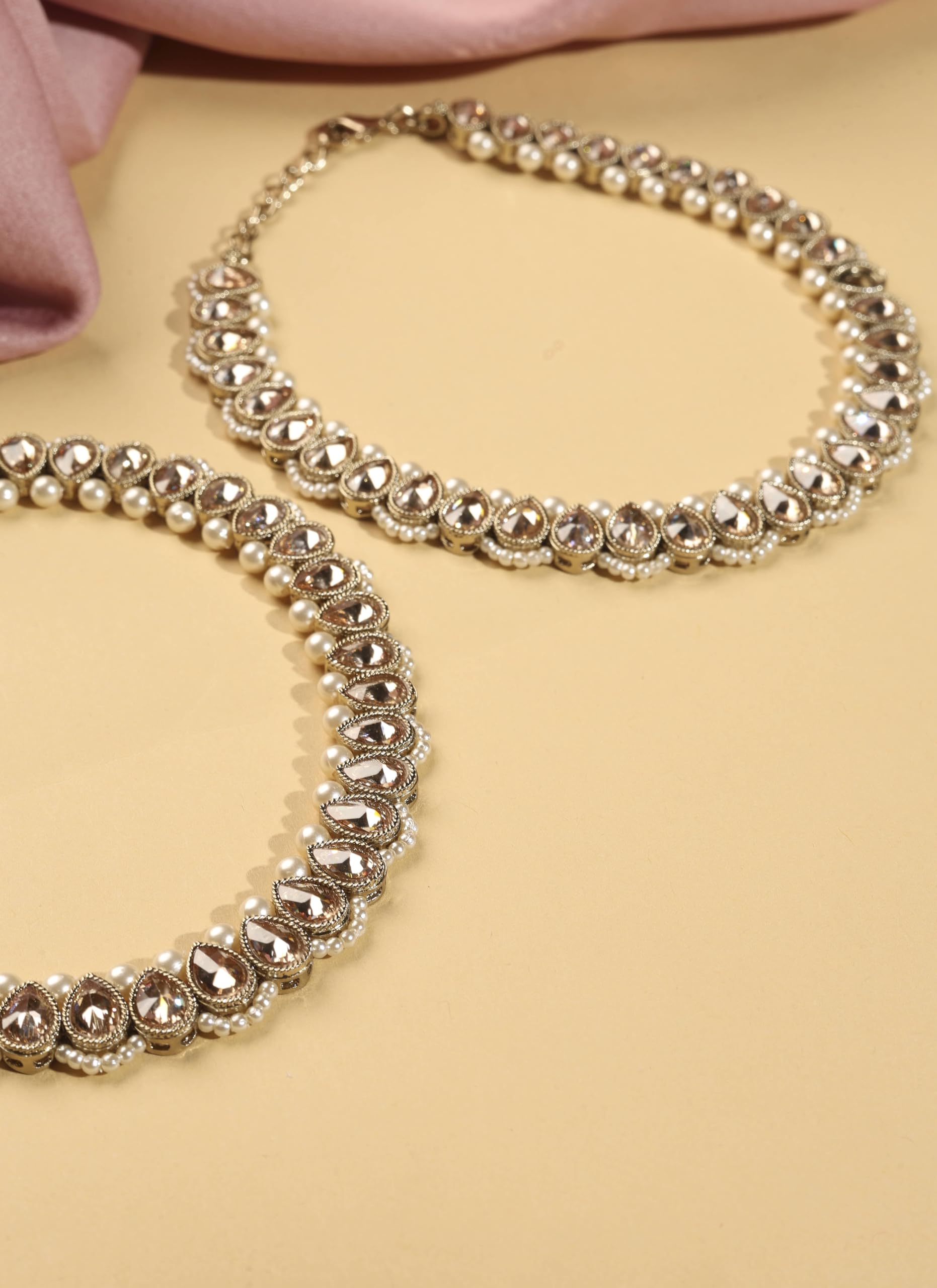 Saloni Fashion Jewellery Astonish Oval Shape Pearl Brown Kundan Stone Antique Gold Plated Set of 2 Anklet(Payal) For Women and Girls