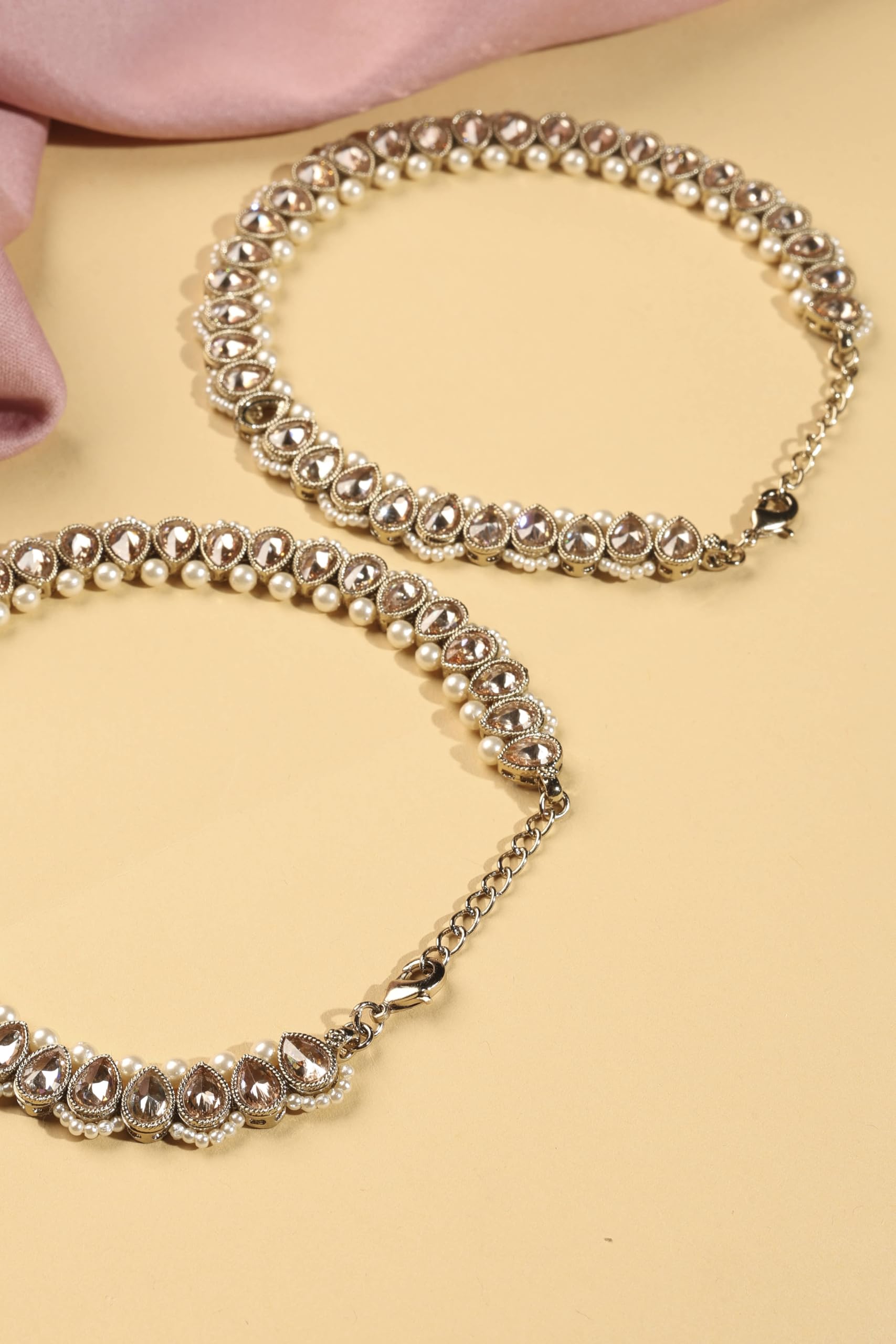 Saloni Fashion Jewellery Astonish Oval Shape Pearl Brown Kundan Stone Antique Gold Plated Set of 2 Anklet(Payal) For Women and Girls