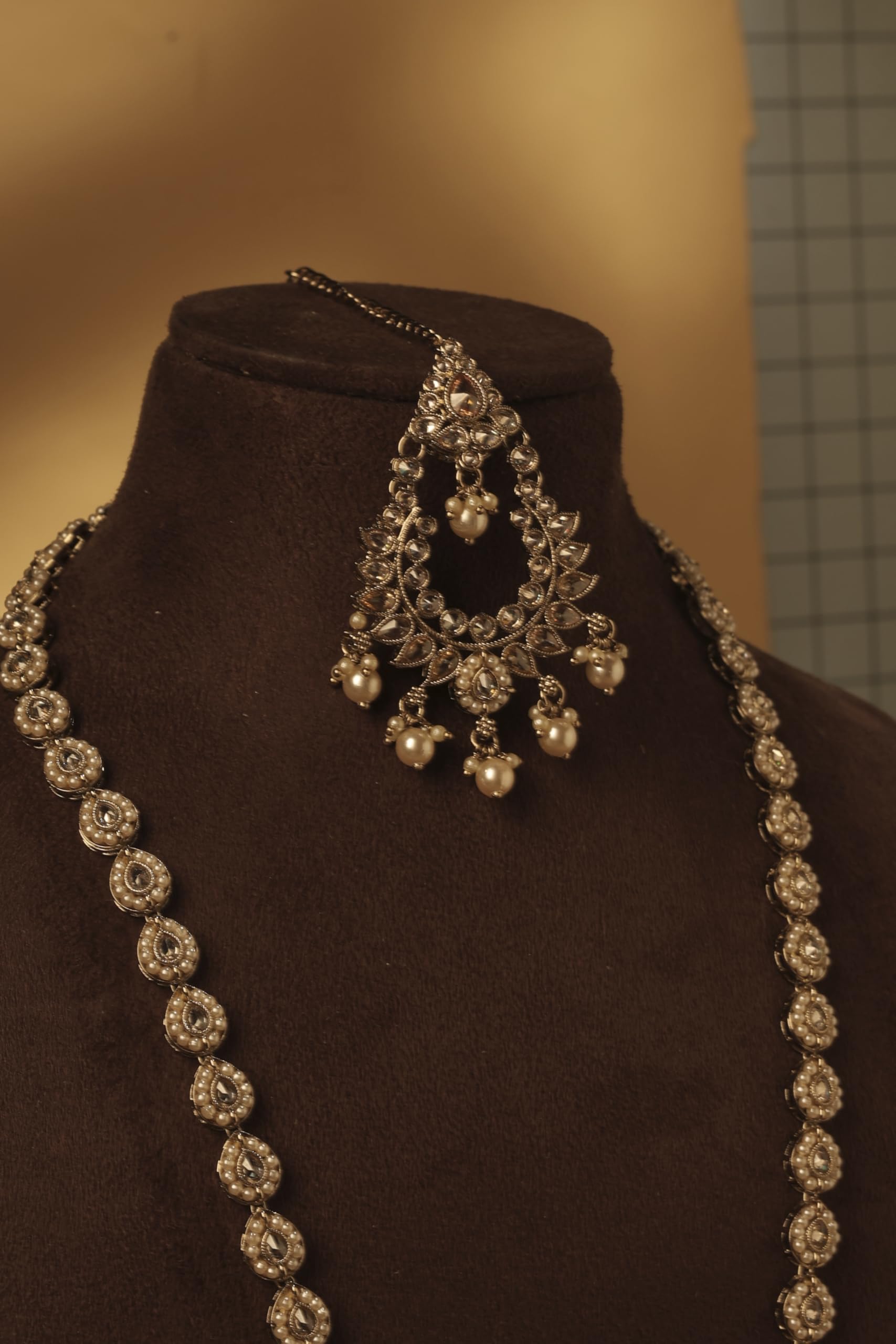 Saloni Fashion Jewellery Marvellous Paisley and Oval Shape Gold Plated Brown Kundan Stone Long Haram Necklace Set With Maang Tikka For Women and Girls