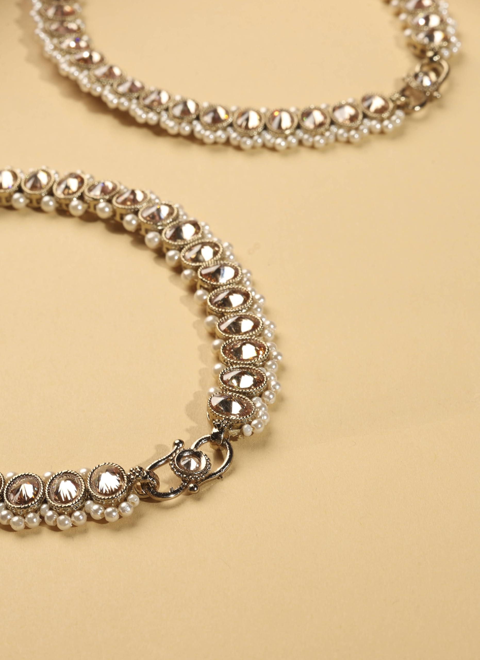 Saloni Fashion Jewellery Elegant Circle Shape Pearl Brown Kundan Stone Antique Gold Plated Set of 2 Anklet(Payal) For Women and Girls