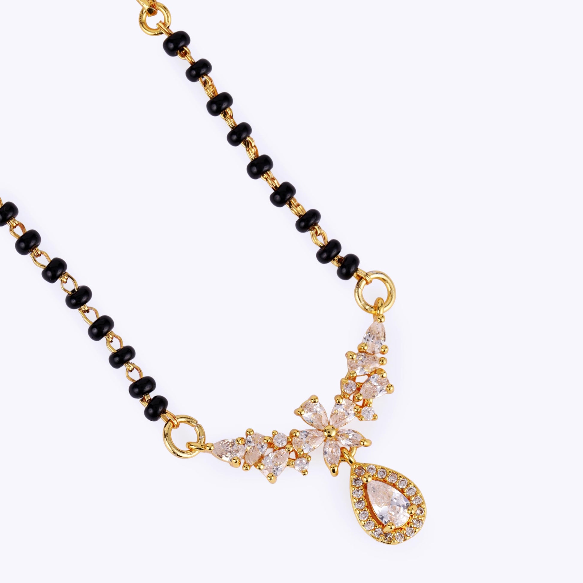 Saloni Fashion Jewellery Traditional Graceful Oval and Flower Design Gold Plated Black Beaded Adjustable Chain Mangalsutra For Women