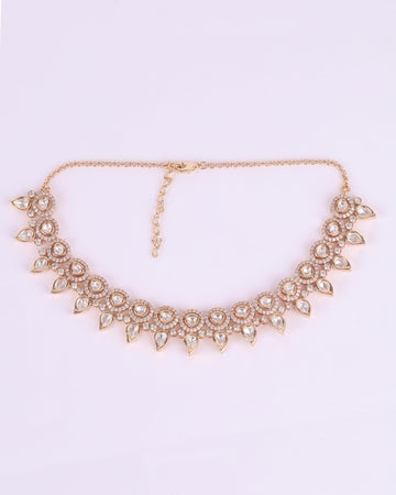 Saloni Fashion Jewellery Lovely Paisley and Round Shape Uncut Kundan Stone Antique Gold Plated Brass Choker Necklace Set with Maang Tikkka For Women and Girls