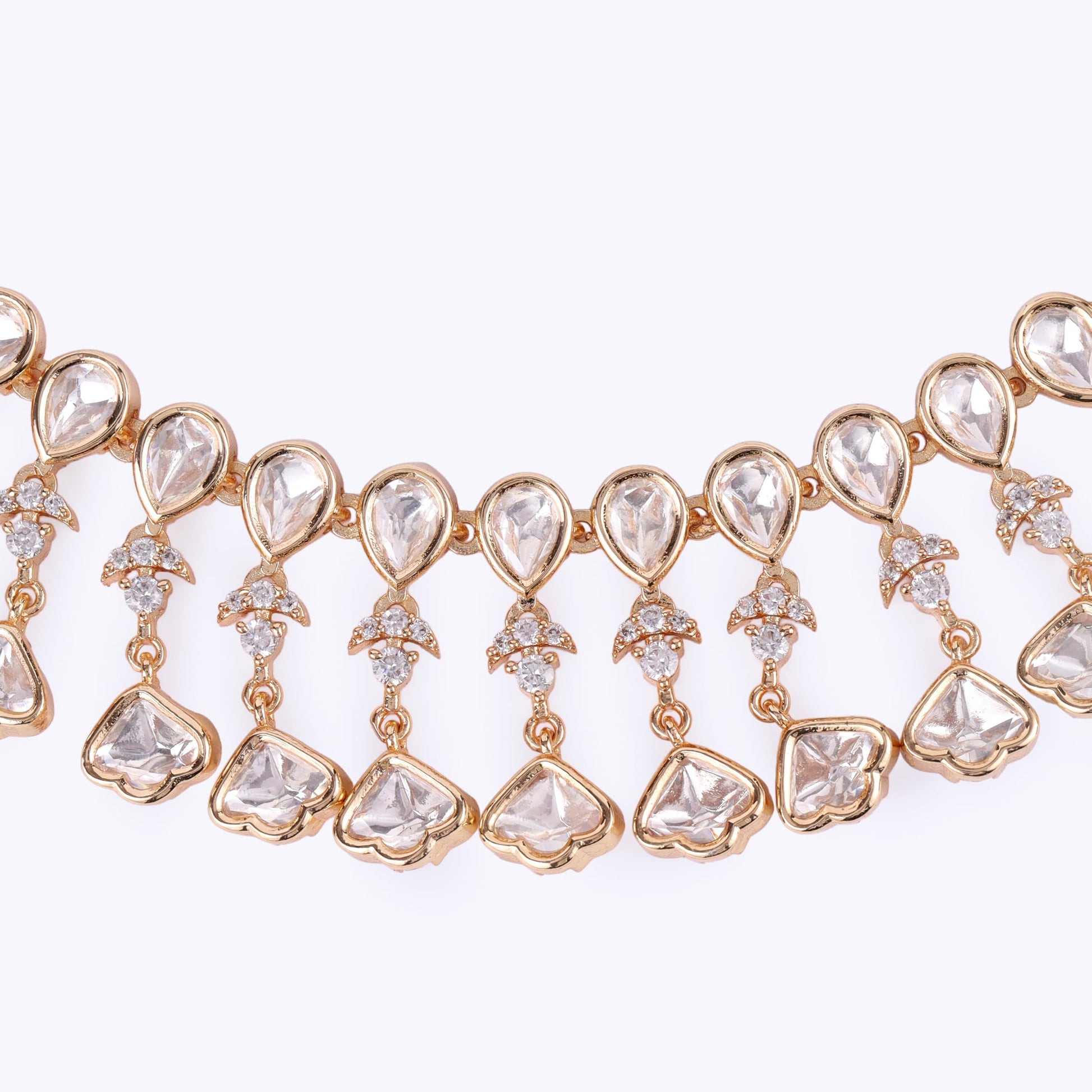Saloni Fashion Jewellery Delightful Oval Shape Uncut Kundan Stone 18 KT Gold Plated Brass Choker Necklace Set with Maang Tikka For Women and Girls