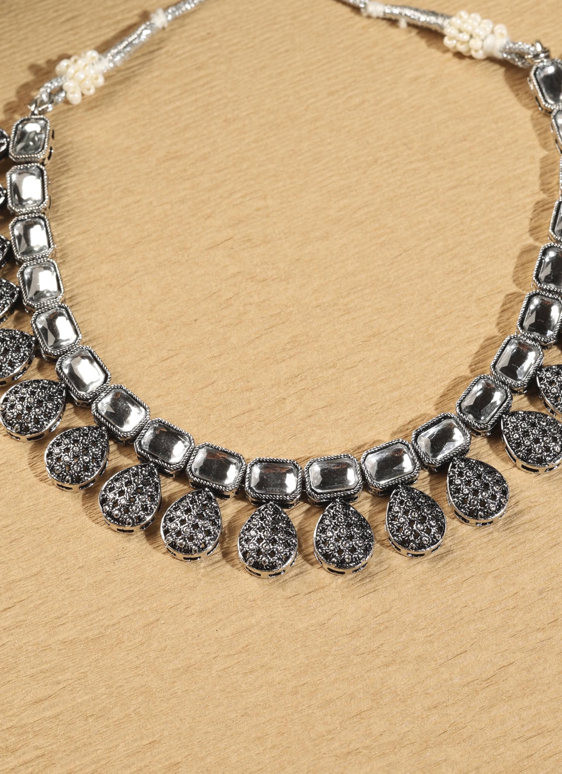 Saloni Fashion Jewellery Modish Oval Shape Silver Kundan Stone Antique Gold Plated Brass Choker Necklace Set with Maang Tikka For Women and Girls