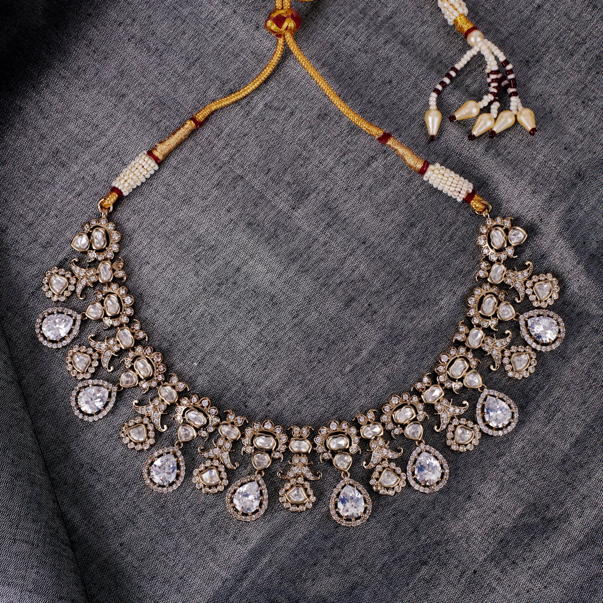 Saloni Fashion Jewellery Elegant Oval Shape Uncut Kundan Stone Gold Plated Brass Choker Necklace Set With Maang Tikka For Women and Girls