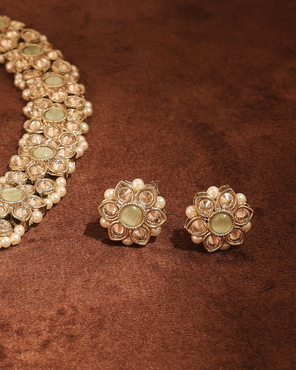 Flower Design Antique Gold Plated Light Green Uncut Kundan Stone - styled view | Saloni Fashion Jewellery, Mumbai