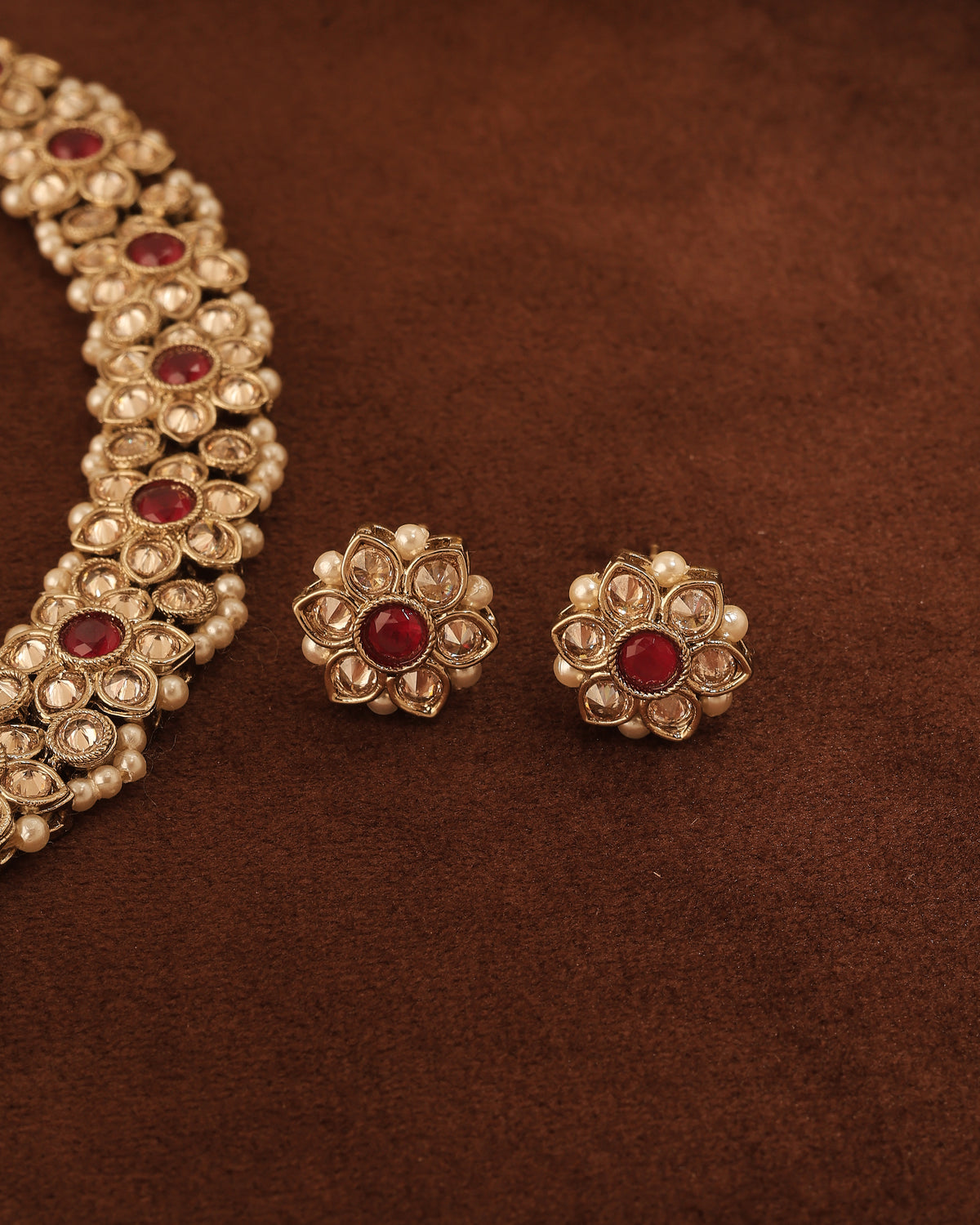 Flower Design Antique Gold Plated Red Uncut Kundan Stone Choker - styled view | Saloni Fashion Jewellery, Mumbai