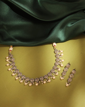Gorgeous Round Shape Pearl Guchha Antique Gold Plated Brown Uncut Kundan Stone Brass Choker Necklace Set