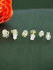 Flower Design CZ Brass Gold Plated Set Of 3 Combo Stud Earring - side view | Saloni Fashion Jewellery, Mumbai