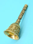 Traditional Swastik and OM Brass Antique Gold Plated Pooja Bell - styled view | Saloni Jewellery