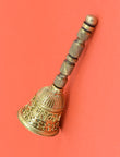 Traditional Mahakaal Brass Antique Gold Plated Pooja Bell - styled view | Saloni Fashion Jewellery, Mumbai