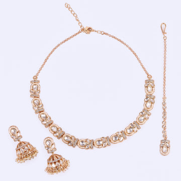 Saloni Fashion Jewellery Oval and Leaf Design Uncut Kundan Stone 18 KT Gold Plated Brass Choker Necklace Set with Maang Tikka For Women and Girls