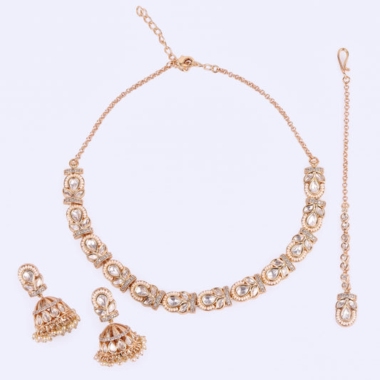 Saloni Fashion Jewellery Oval and Leaf Design Uncut Kundan Stone 18 KT Gold Plated Brass Choker Necklace Set with Maang Tikka For Women and Girls