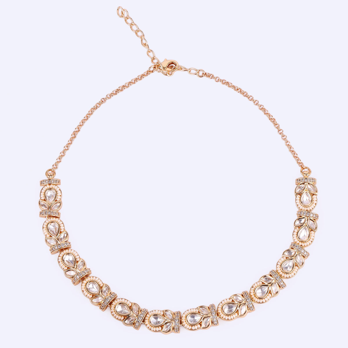 Saloni Fashion Jewellery Oval and Leaf Design Uncut Kundan Stone 18 KT Gold Plated Brass Choker Necklace Set with Maang Tikka For Women and Girls - view 5
