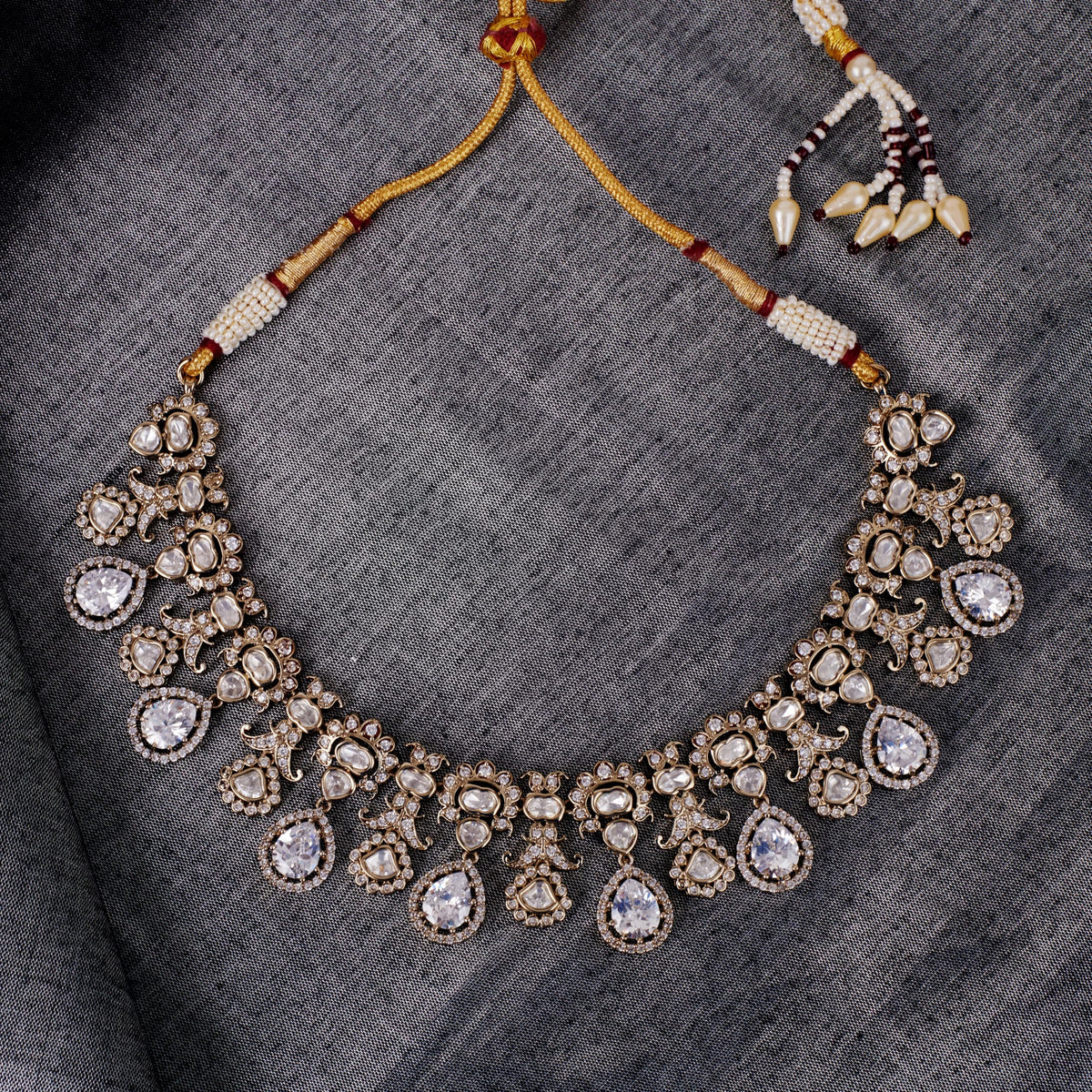 Saloni Fashion Jewellery Oval Shape Uncut Kundan Stone Gold Plated Brass Choker Necklace Set With Maang Tikka For Women and Girls
