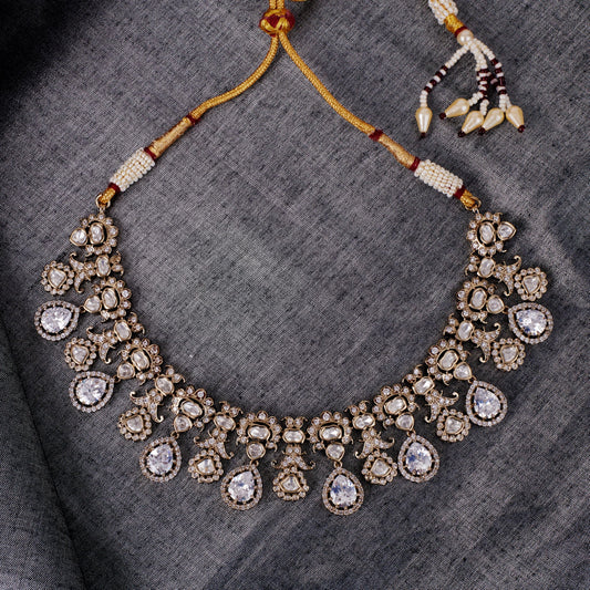 Saloni Fashion Jewellery Oval Shape Uncut Kundan Stone Gold Plated Brass Choker Necklace Set With Maang Tikka For Women and Girls