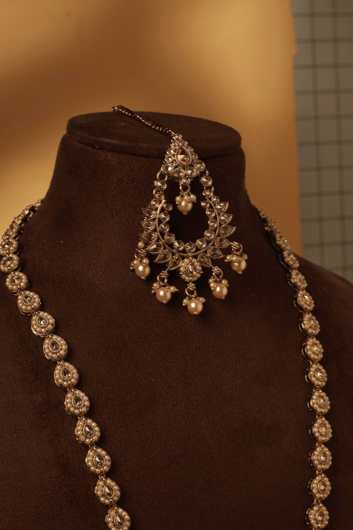 Saloni Fashion Jewellery Paisley and Oval Shape Gold Plated Brown Kundan Stone Long Haram Necklace Set With Maang Tikka For Women and Girls