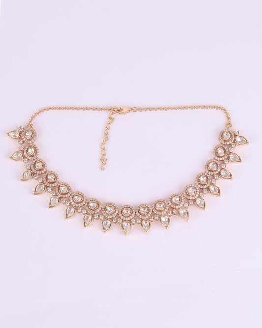 Saloni Fashion Jewellery Paisley and Round Shape Uncut Kundan Stone Antique Gold Plated Brass Choker Necklace Set with Maang Tikka For Women and Girls
