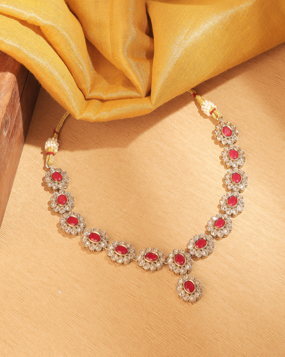 Round and Oval Shape Antique Gold Plated Red Uncut Kundan Stone - side view | Saloni Fashion Jewellery, Mumbai