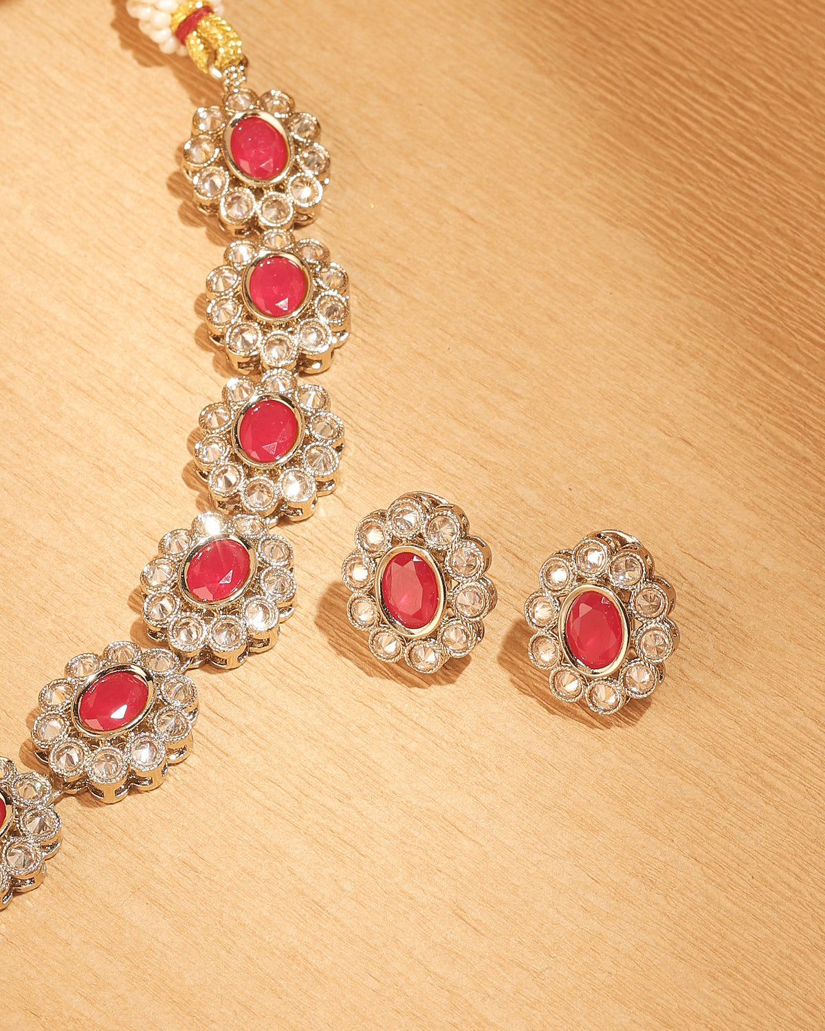 Round and Oval Shape Antique Gold Plated Red Uncut Kundan Stone - styled view | Saloni Fashion Jewellery, Mumbai