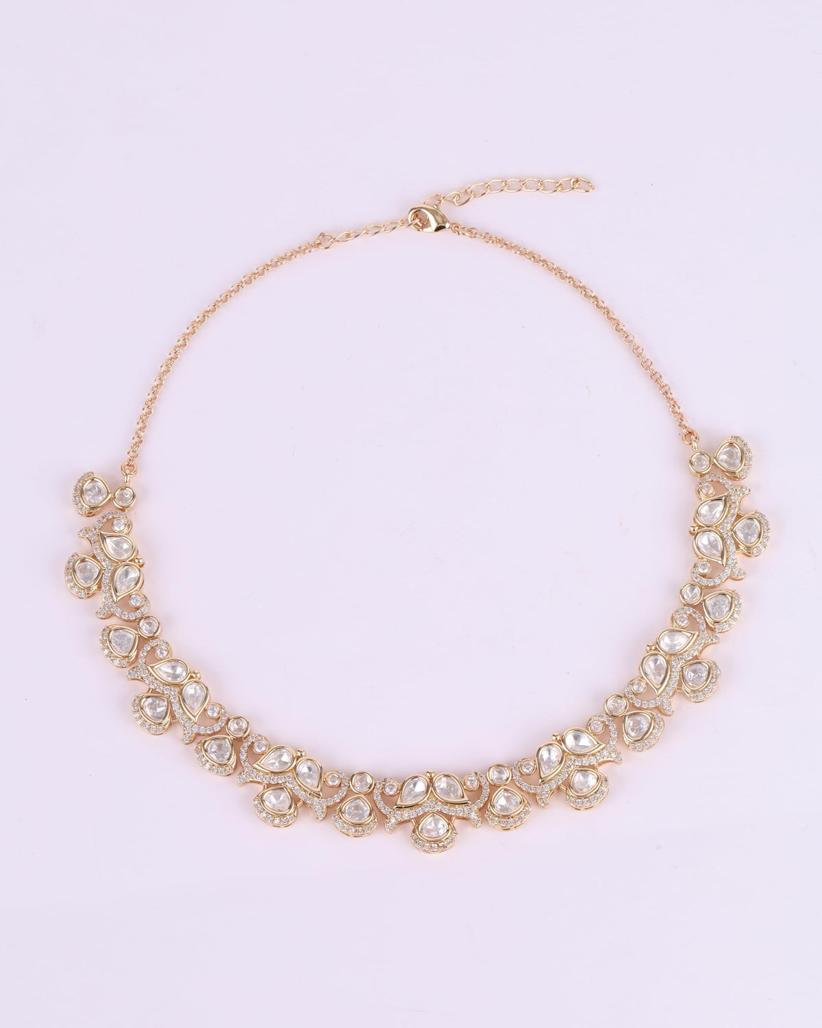 Saloni Fashion Jewellery Round and Paisley Shape CZ Studded Uncut Kundan Stone Rose Gold Plated Brass Choker Necklace Set with Maang Tikka For Women and Girls