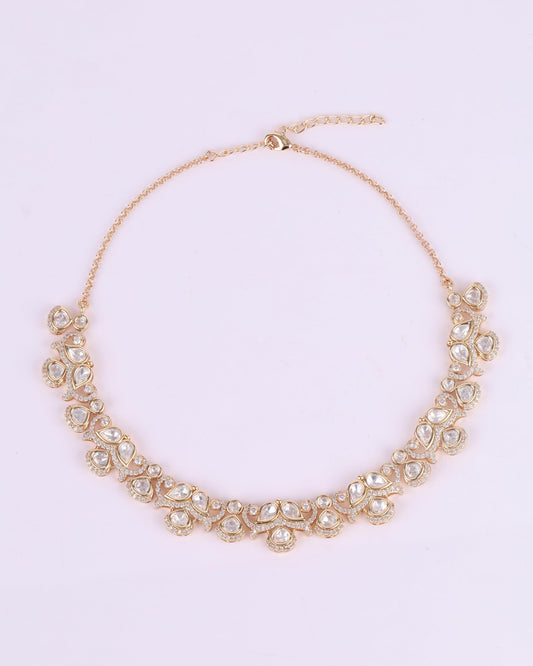 Saloni Fashion Jewellery Round and Paisley Shape CZ Studded Uncut Kundan Stone Rose Gold Plated Brass Choker Necklace Set with Maang Tikka For Women and Girls