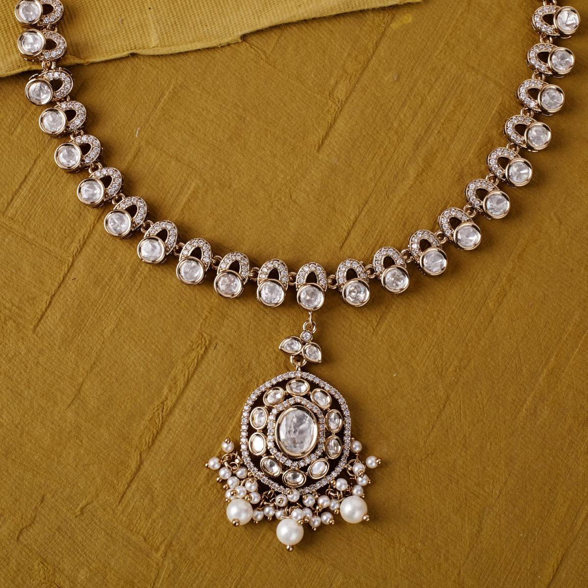 Saloni Fashion Jewellery Round Shape Mother of Pearl Uncut Kundan Stone Gold Plated Brass Choker Necklace Set With Maang Tikka For Women and Girls