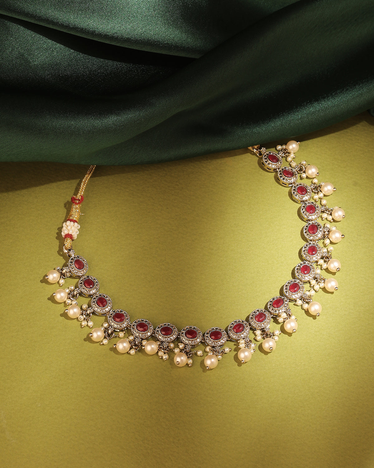 Round Shape Pearl Guchha Antique Gold Plated Red Uncut Kundan Stone - side view | Saloni Fashion Jewellery, Mumbai