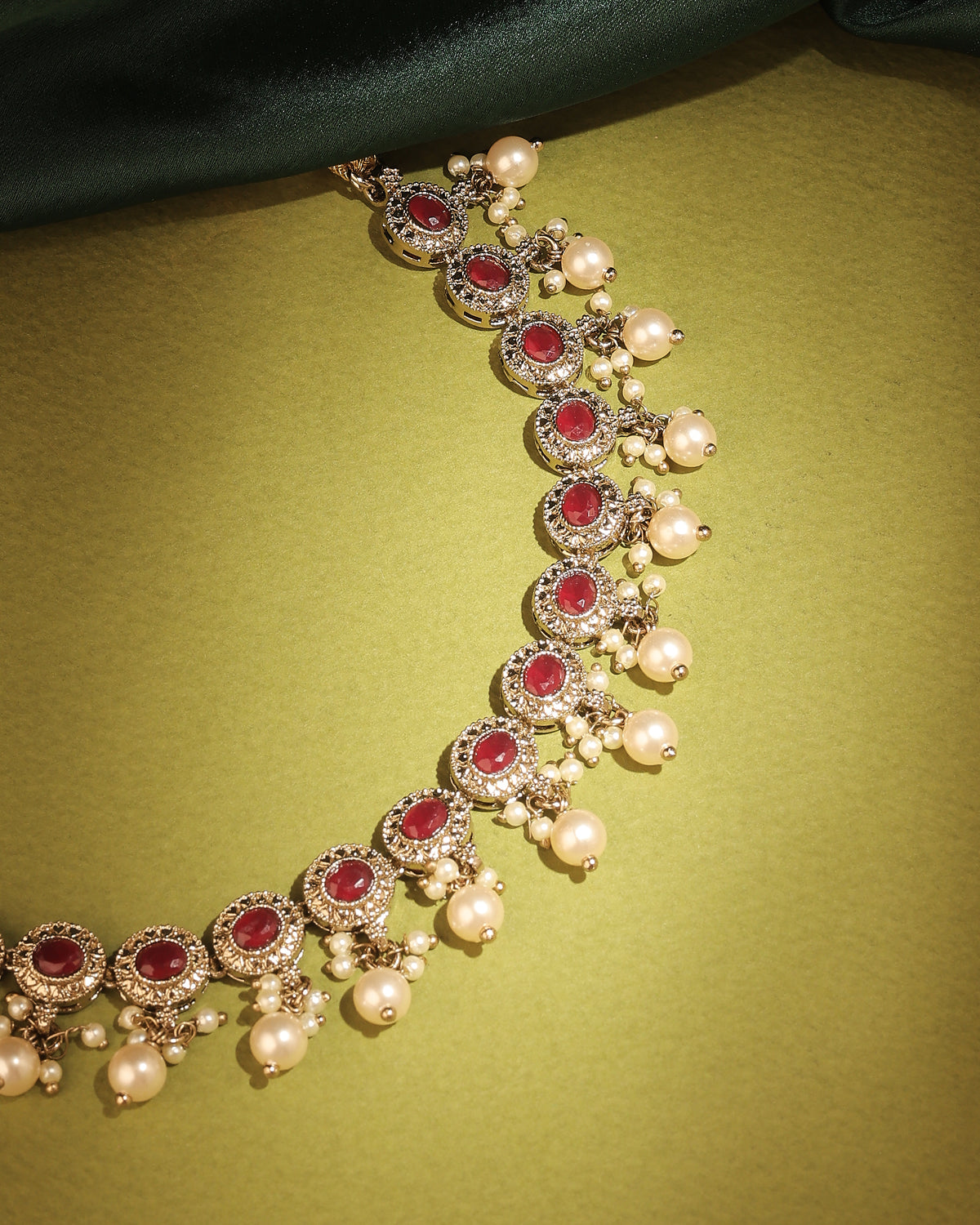 Round Shape Pearl Guchha Antique Gold Plated Red Uncut Kundan - styled view | Saloni Fashion Jewellery, Mumbai